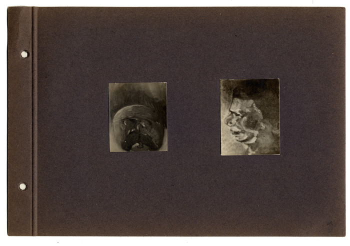 Albumseite — zwei Köpfe (um 1910)